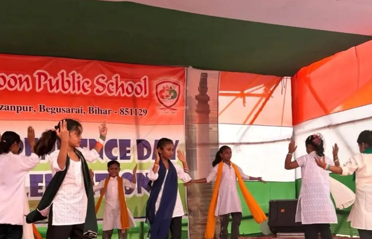 Students performing a patriotic dance on the Independence Day stage